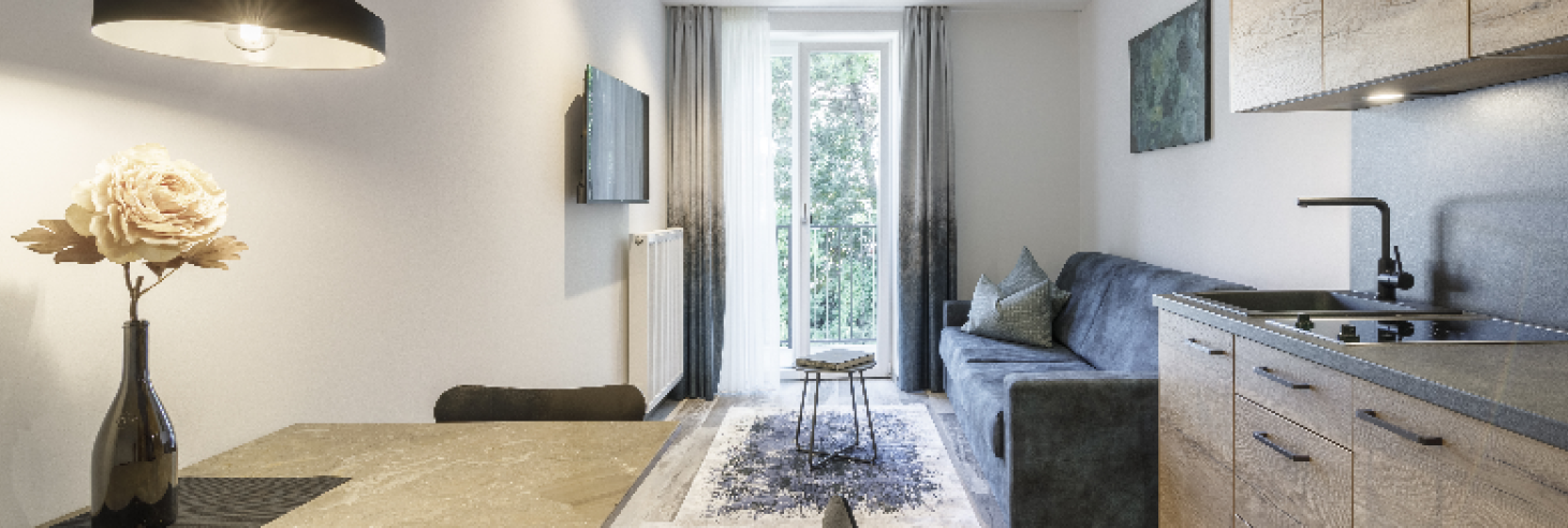 Apartment Dolomit mit Balkon Modernes Apartment im Boutique Hotel Sole mit offener Wohnküche, gemütlichem Sofa, Esstisch und Balkonzugang. Hell, mit stilvoller Beleuchtung.